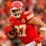 Jan 18, 2025; Kansas City, Missouri, USA; Kansas City Chiefs tight end Travis Kelce (87) runs with the ball during the first half against Houston Texans in a 2025 AFC divisional round game at GEHA Field at Arrowhead Stadium.