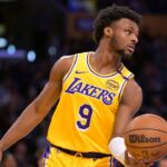 Los Angeles Lakers guard Bronny James (9) inbound the ball in the second half against the Denver Nuggets at Crypto.com Arena.