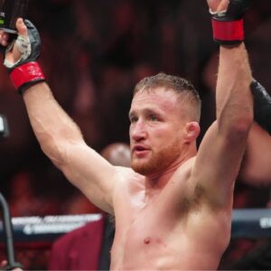 Justin Gaethje (red gloves) reacts after fighting Rafael Fiziev (not pictured) during UFC 313 at T-Mobile Arena.