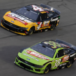 NASCAR Cup Series driver Zane Smith (38) alongside Noah Gragson (4) during practice for the Daytona 500 at Daytona International Speedway.
