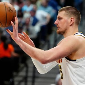 Denver Nuggets center Nikola Jokic (15) inbounds the ball in the second half against the Washington Wizards at Ball Arena.
