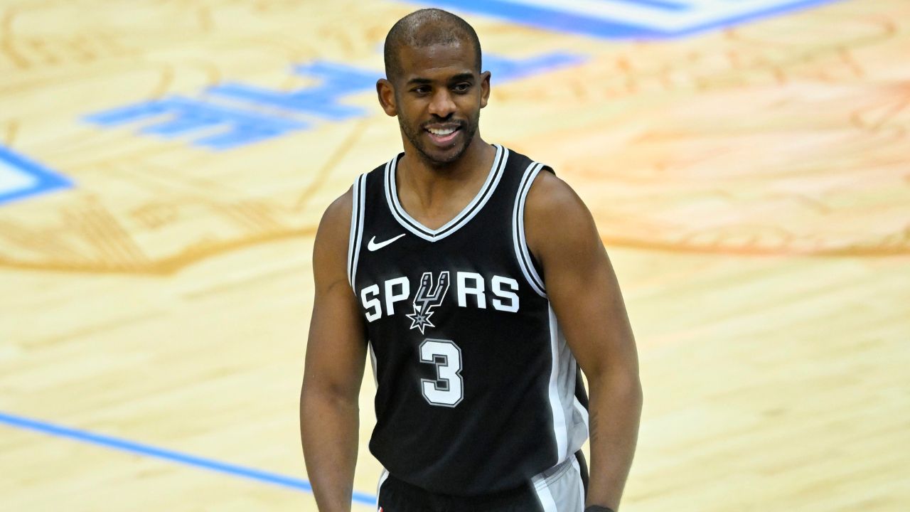 Mar 27, 2025; Cleveland, Ohio, USA; San Antonio Spurs guard Chris Paul (3) reacts after a play in the fourth quarter against the Cleveland Cavaliers at Rocket Arena. Mandatory Credit: David Richard-Imagn Images