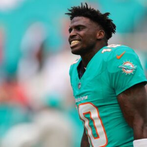 Miami Dolphins wide receiver Tyreek Hill (10) reacts on the field before the game against the San Francisco 49ers at Hard Rock Stadium. Mandatory Credit: Sam