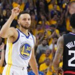 Golden State Warriors guard Stephen Curry (30) celebrates against LA Clippers guard Lou Williams (23) during the first quarter in game one of the first round of the 2019 NBA Playoffs at Oracle Arena.