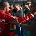 Lewis Hamilton of Great Britain and Scuderia Ferrari celebrates his pole with his father Anthony Hamilton during Sprint Qualifying ahead of the F1 Grand Prix of China