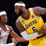 Oklahoma City Thunder guard Shai Gilgeous-Alexander (2) defends against Los Angeles Lakers forward LeBron James (6) in the second quarter at Crypto.com Arena