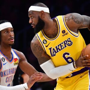 Oklahoma City Thunder guard Shai Gilgeous-Alexander (2) defends against Los Angeles Lakers forward LeBron James (6) in the second quarter at Crypto.com Arena