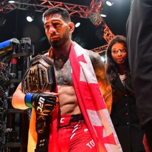 Ilia Topuria celebrates his championship victory against Alexander Volkanovski during UFC 298 at Honda Center.