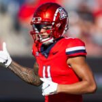 Nov 30, 2024; Tucson, Arizona, USA; Arizona Wildcats wide receiver Tetairoa McMillan (4) against the Arizona State Sun Devils during the Territorial Cup at Arizona Stadium.