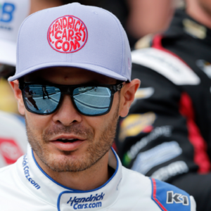 Mar 2, 2025; Austin, Texas, USA; NASCAR Cup Series driver Kyle Larson (5) walks into EchoPark Automotive Grand Prix for driver introductions at Circuit of the Americas. Mandatory Credit: Jamie Harms-Imagn Images