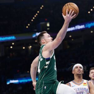 Milwaukee Bucks guard Pat Connaughton (24) shoots against the Oklahoma City Thunder during the second quarter at Paycom Center