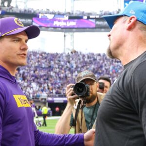 Oct 20, 2024; Minneapolis, Minnesota, USA; Minnesota Vikings head coach Kevin O'Connell and Detroit Lions head coach Dan Campbell shakes hands after the game at U.S. Bank Stadium.