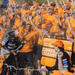 Lando Norris, Oscar Piastri and McLaren F1 team celebrate constructors championship title win during Formula One Abu Dhabi Grand Prix