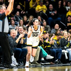 Iowa guard Caitlin Clark (22) reacts after making a 3-point basket during a NCAA Big Ten Conference women's basketball game against Purdue, Thursday, Dec. 29, 2022, at Carver-Hawkeye Arena in Iowa City, Iowa.