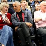 Mar 5, 2025; Inglewood, California, USA; Barack Obama, the 44th President of the United States talks to Connie Snyder, the wife of LA Clippers owner Steve Balmer during the first quarter between the Clippers and the Detroit Pistons at Intuit Dome. Mandatory Credit: Jason Parkhurst-Imagn Images