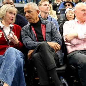 Mar 5, 2025; Inglewood, California, USA; Barack Obama, the 44th President of the United States talks to Connie Snyder, the wife of LA Clippers owner Steve Balmer during the first quarter between the Clippers and the Detroit Pistons at Intuit Dome. Mandatory Credit: Jason Parkhurst-Imagn Images