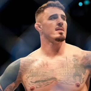 Tom Aspinall celebrates after knocking out Marcin Tybura during UFC Fight Night: London the at the O2, London, England on the 22 July 2023.