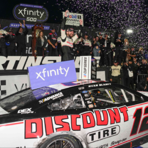 Nov 3, 2024; Martinsville, Virginia, USA; NASCAR Cup Series driver Ryan Blaney (12) wins the Xfinity 500 at Martinsville Speedway. Mandatory Credit: Jim Dedmon-Imagn Images