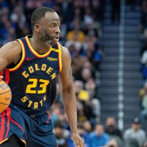 Mar 15, 2025; San Francisco, California, USA; Golden State Warriors forward Draymond Green (23) looks to pass the basketball against the New York Knicks during the third quarter at Chase Center.