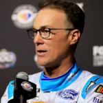 Nascar driver Kevin Harvick speak to reporters during the 2023 media day. Mandatory Credit: © NADIA ZOMORODIAN/NEWS-JOURNAK / USA TODAY NETWORK.