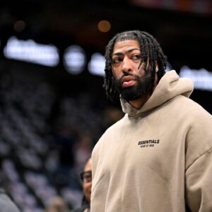 Dallas Mavericks forward Anthony Davis (3) watches team warm ups before the game between the Dallas Mavericks and the Detroit Pistons at the American Airlines Center.