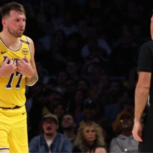 Los Angeles Lakers guard Luka Doncic (77) talks to NBA referee Brent Barnaky (36) during the second quarter against the Minnesota Timberwolves at Crypto.com Arena