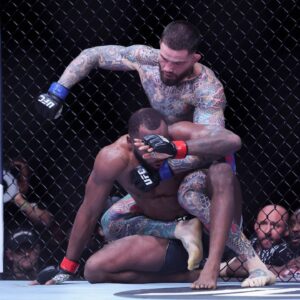UFC Fight Night London, Leon Edwards versus Sean Brady; Sean Brady of United States punches Leon Edwards of England