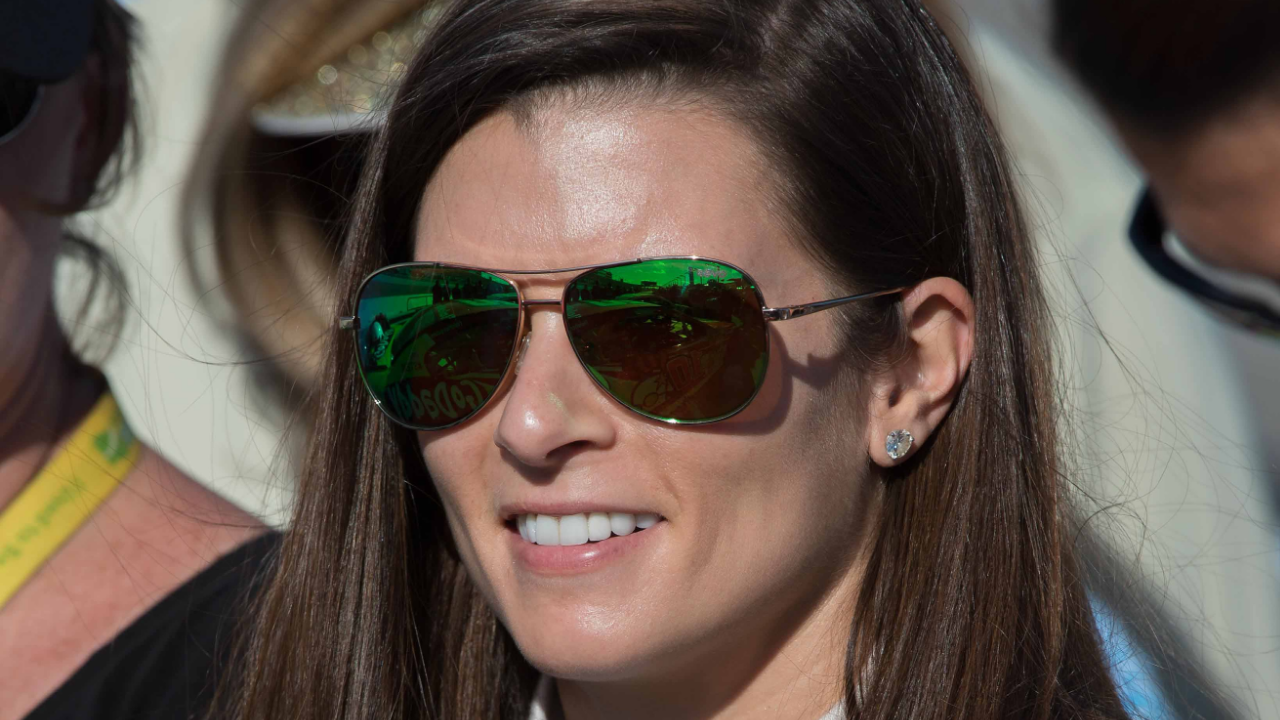 Nov 16, 2014; Homestead, FL, USA; Sprint Cup Series driver Danica Patrick (10) before the Ford EcoBoost 400 at Homestead-Miami Speedway. Mandatory Credit: Jerome Miron-Imagn Images