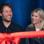 Mathew and Kelly Stafford share a laugh during speeches for the ribbon cutting of the Kelly and Matthew Stafford and Friends Education Center at the S.A.Y Detroit Play Center in Detroit on Monday, April 1, 2024.