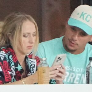 Kansas City Chiefs quarterback Patrick Mahomes and wife Brittany watch play during the first half against the Washington Spirit at CPKC Stadium