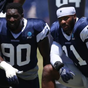 Jul 30, 2024; Oxnard, CA, USA; Dallas Cowboys defensive end DeMarcus Lawrence (90) and linebacker Micah Parsons (11) during training camp at the River Ridge Playing Fields in Oxnard, California.