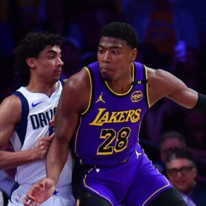 Los Angeles Lakers forward Rui Hachimura (28) dribbles the ball on Dallas Mavericks guard Max Christie (00) during the first quarter at Crypto.com Arena