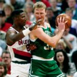 Boston Celtics forward Larry Bird (33) is defended by Portland Trail Blazers forward Jerome Kersey (25) at Memorial Coliseum
