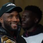 Villa Park UFC Welterweight Champion Leon Edwards on the pitch at half time during the Premier League match at Villa Park, Birmingham. Picture date: Saturday December 30, 2023.