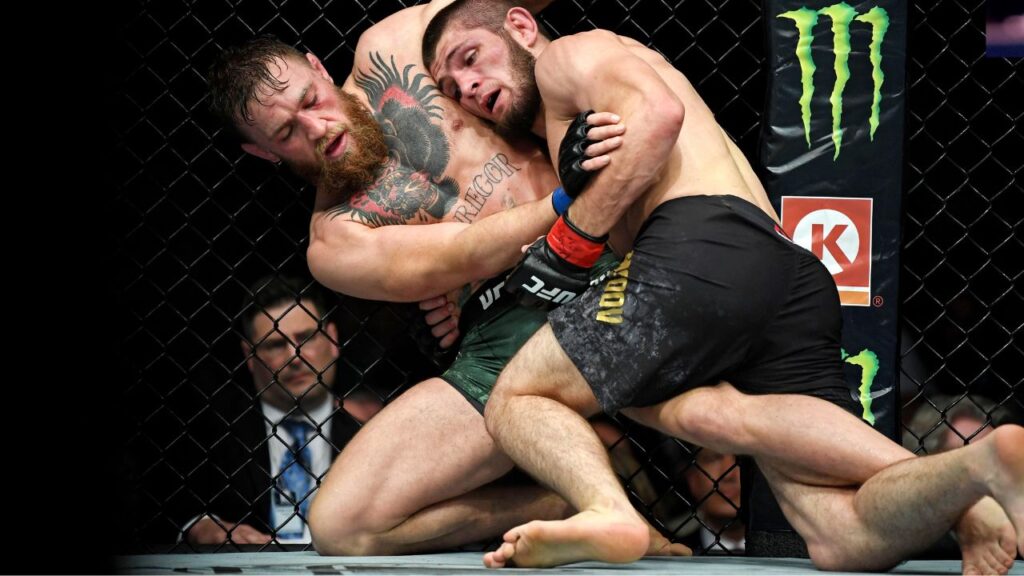 Khabib Nurmagomedov (red gloves) fights Conor McGregor (blue gloves) during UFC 229 at T-Mobile Arena.