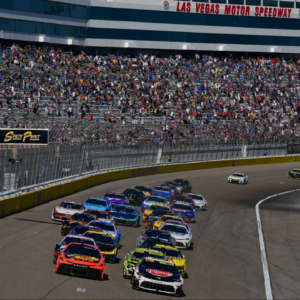 Oct 20, 2024; Las Vegas, Nevada, USA; NASCAR Cup Series driver Christopher Bell (20) leads the restart of the South Point 400 at Las Vegas Motor Speedway. Mandatory Credit: Gary A. Vasquez-Imagn Images