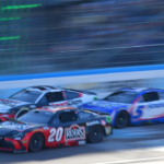 Mar 9, 2025; Avondale, Arizona, USA; NASCAR Cup Series driver Christopher Bell (20) crosses the finish line ahead of driver Denny Hamlin (11) and driver Kyle Larson (5) to win the Shriners Children’s 500 at Phoenix Raceway. Mandatory Credit: Gary A. Vasquez-Imagn Images