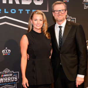 Nov 22, 2024; Charlotte, NC, USA; Dale Earnhardt Jr. and wife Amy during the NASCAR Awards Banquet at Charlotte Convention Center. Mandatory Credit: Jim Dedmon-Imagn Images