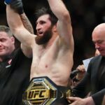 ; Magomed Ankalaev (blue gloves) reacts after defeating Alex Pereira (not pictured) during UFC 313 at T-Mobile Arena.
