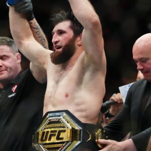 ; Magomed Ankalaev (blue gloves) reacts after defeating Alex Pereira (not pictured) during UFC 313 at T-Mobile Arena.