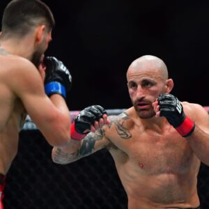 ; Alexander Volkanovski fights against Ilia Topuria during UFC 298 at Honda Center.