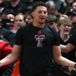Feb 24, 2025; Lubbock, Texas, USA; NFL Kansas City Chiefs player and Texas Tech Red Raiders alumni Patrick Mahomes II reacts to a call in the second half in the game against the Houston Cougars at United Supermarkets Arena.