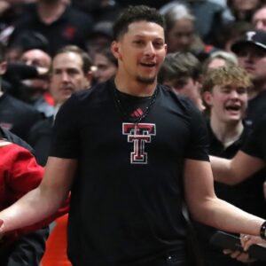 Feb 24, 2025; Lubbock, Texas, USA; NFL Kansas City Chiefs player and Texas Tech Red Raiders alumni Patrick Mahomes II reacts to a call in the second half in the game against the Houston Cougars at United Supermarkets Arena.