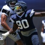 Jul 30, 2024; Oxnard, CA, USA; Dallas Cowboys defensive end DeMarcus Lawrence (90) rushes during training camp at the River Ridge Playing Fields in Oxnard, California.