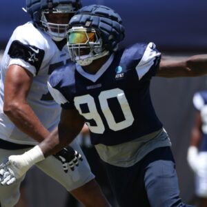 Jul 30, 2024; Oxnard, CA, USA; Dallas Cowboys defensive end DeMarcus Lawrence (90) rushes during training camp at the River Ridge Playing Fields in Oxnard, California.