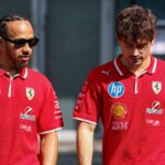 Lewis Hamilton of Great Britain and Scuderia Ferrari and Charles Leclerc of Monaco and Scuderia Ferrari walks in the paddock during practice ahead of the F1 Grand Prix of CHINA at Shanghai International Circuit