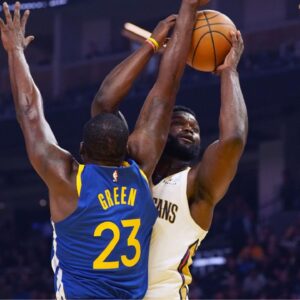 New Orleans Pelicans forward Zion Williamson (1) has his shot blocked by Golden State Warriors forward Draymond Green (23) in the first quarter at Chase Center.