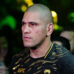 Alex Pereira (red gloves) prepares to fight Magomed Ankalaev (not pictured) during UFC 313 at T-Mobile Arena.