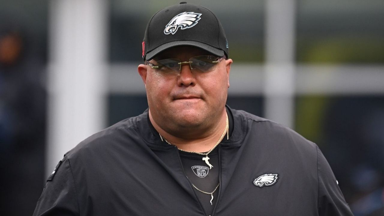 Philadelphia Eagles head of security Dom DiSandro walks the sideline before a game against the New England Patriots at Gillette Stadium.