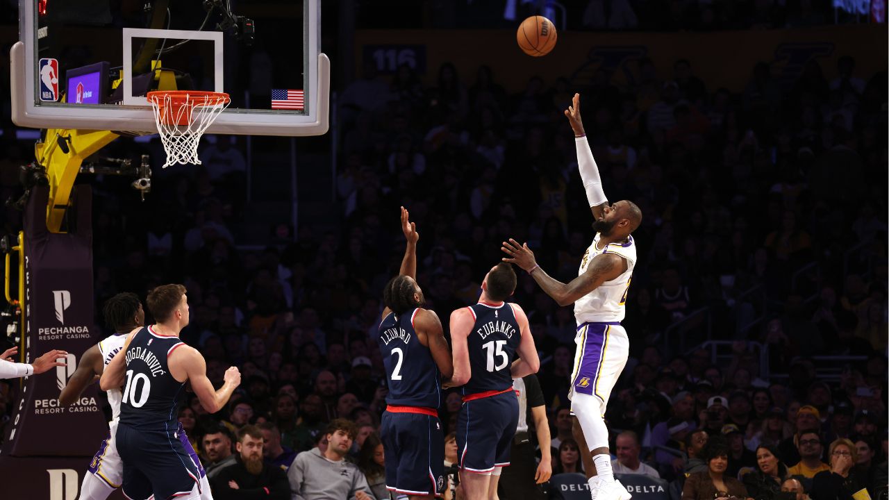 Los Angeles Lakers forward LeBron James (23) shoots against LA Clippers forward Drew Eubanks (15) and forward Kawhi Leonard (2) during the fourth quarter at Crypto.com Arena